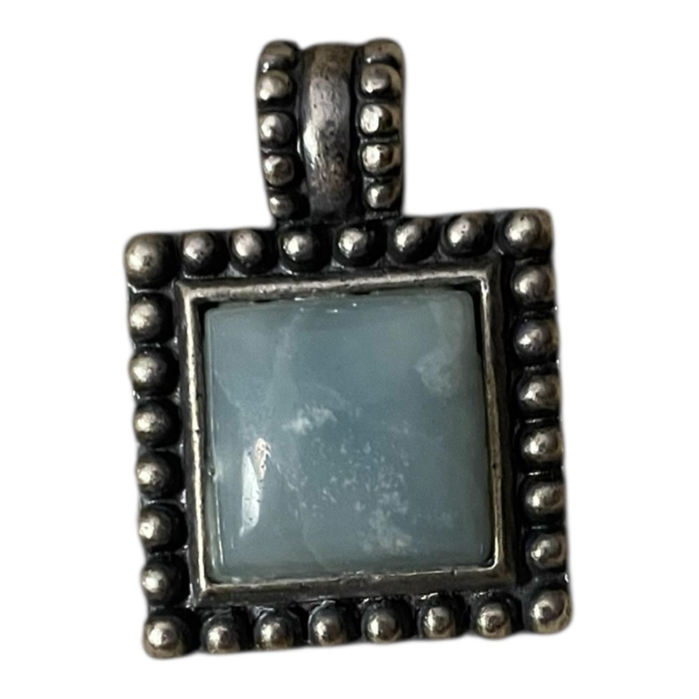Elegant Silver Pendant with Blue Stone